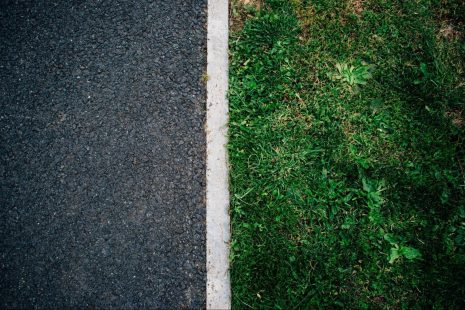 edge where road meets the grass